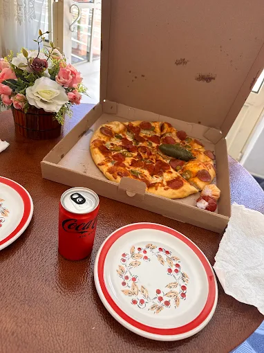 Foto de portada del establecimiento Pizza y Más